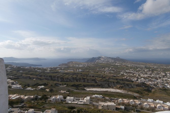 6 hours Private Full Santorini Highlights - Kamari Beach, a livelier black-beach resort