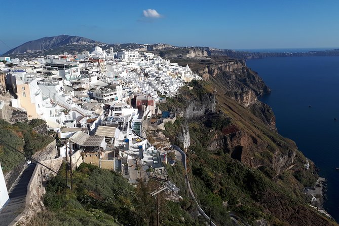 Amazing sightseeing in Santorini 2022 - Perivolos and the black-sand shore