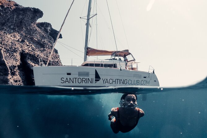 Beautiful Day Catamaran Caldera Cruise incl. Meal & Drinks - Starting at Ammoudi Bay