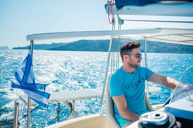 Best of Santorini Private Half-Day Catamaran Cruise with transfer and meal - White Beach, a quieter cove reached only by sea