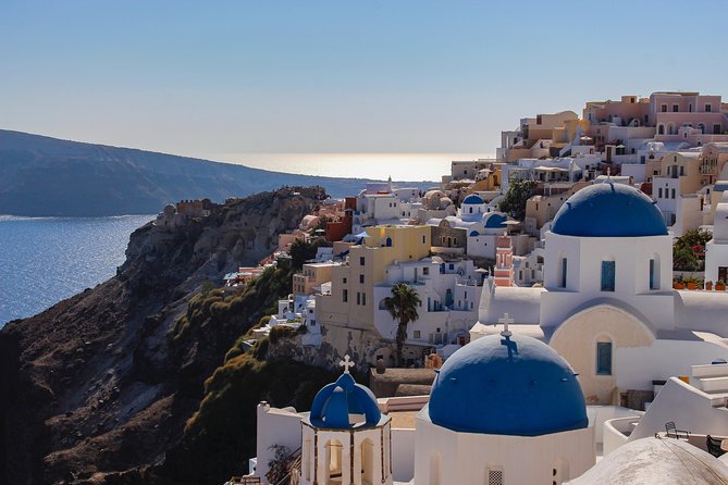 Blue Dome and Oia Sunset Small Group Transfer - The sunset question: guided viewpoint or free exploration?
