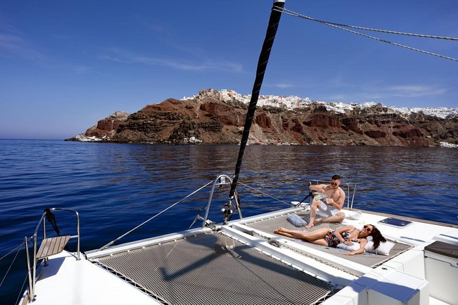 Caldera Cruise with Swim Stops, BBQ on board and drinks! - Why seeing Santorini from the water matters