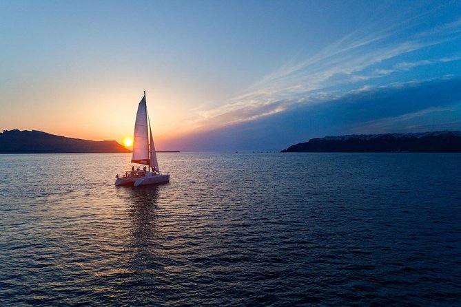 Caldera Cruise with Swim Stops, BBQ on board and drinks! - Lunch, BBQ, and drinks onboard