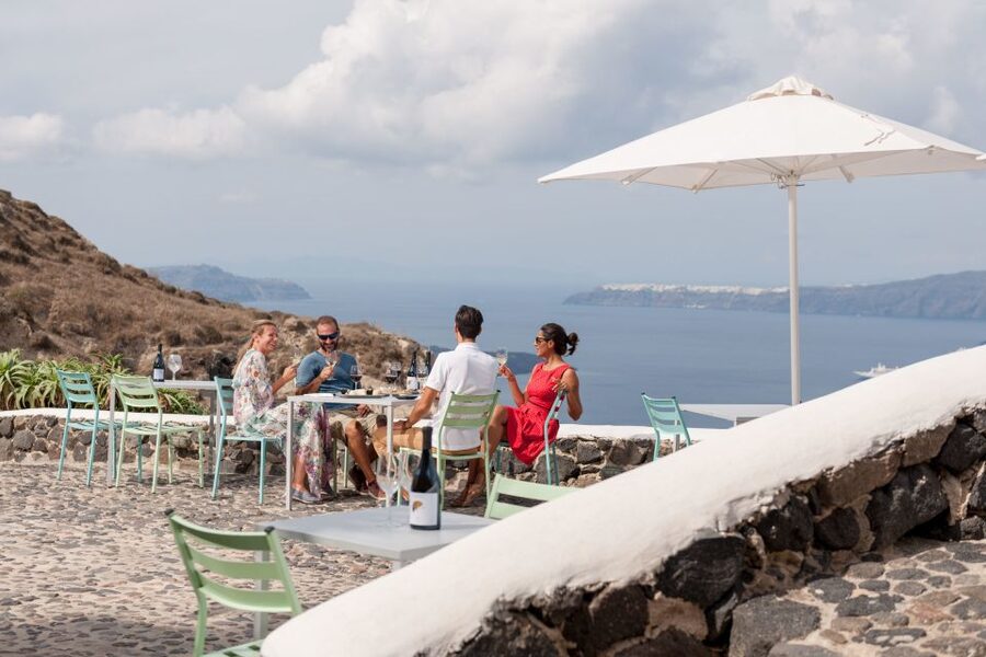 Discover Santorini: Prehistoric Akrotiri & Winery Tour - Whitewashed houses and winding village streets