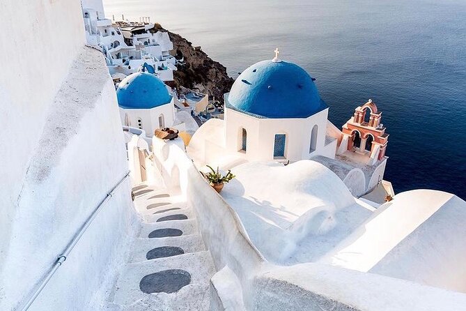 Discover the Cultural Heart of Santorini with Mεliton Tours - Three Bells of Fira adds a classic church view