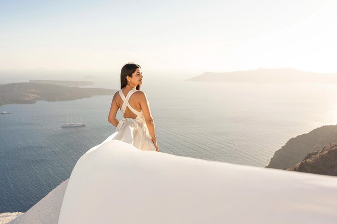 Embark on a Flying Dress Photoshoot in Santorini - Choosing the dress before the camera comes out