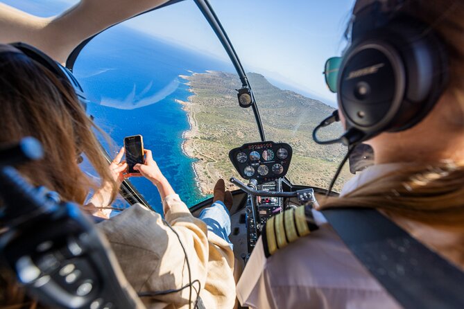 Experience Santorini Sunset by Helicopter - Akrotiri, red cliffs, and an ancient settlement