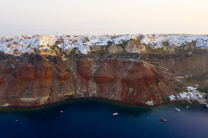 Experience Santorini Sunset by Helicopter - Taking off above Oia at sunset