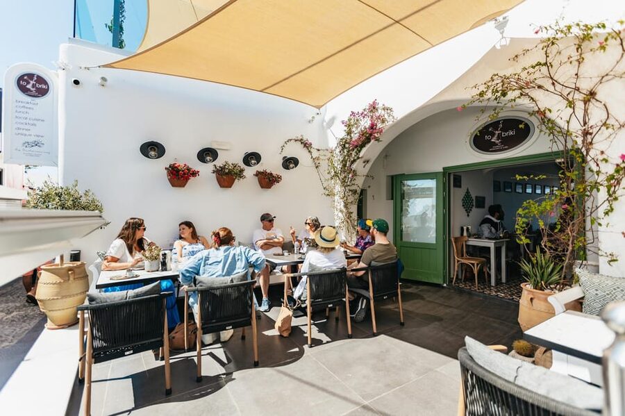 Fira: Guided Foodie Walking Tour with Tastings - A generous midday meal above the caldera