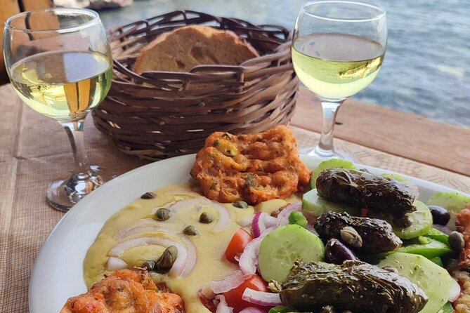 Flavors of Santorini Food and Wine Private Sunset Tour - Red Beach adds a short burst of scenery