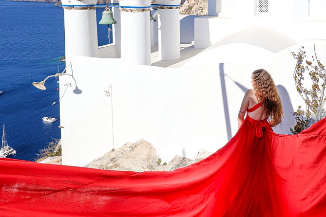 Flying Dress Photoshoot Experience in Santorini with pick up - The real value at $335.51 per person