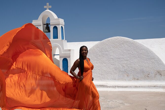 Flying Dress Photoshoot in Oia Private entry to Blue Dome - Key points at a glance