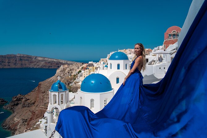Flying Dress Photoshoot in Oia Private entry to Blue Dome - The flying dress and the finished photos