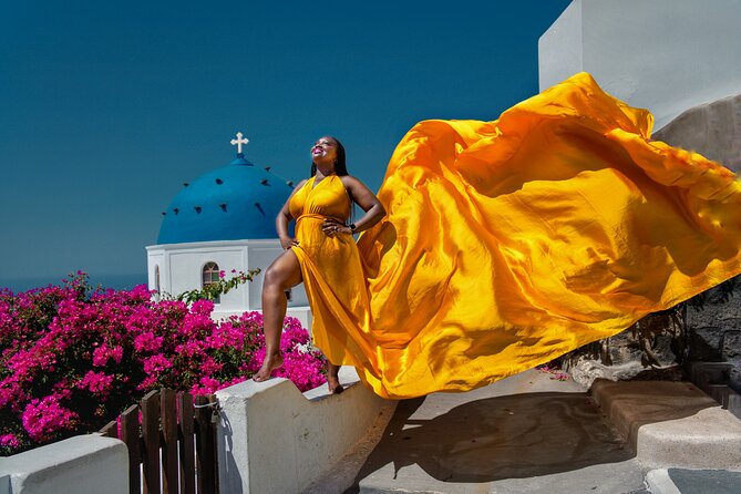 Flying Dress Photoshoot in Oia Private entry to Blue Dome - The Blue Dome stop and its limits