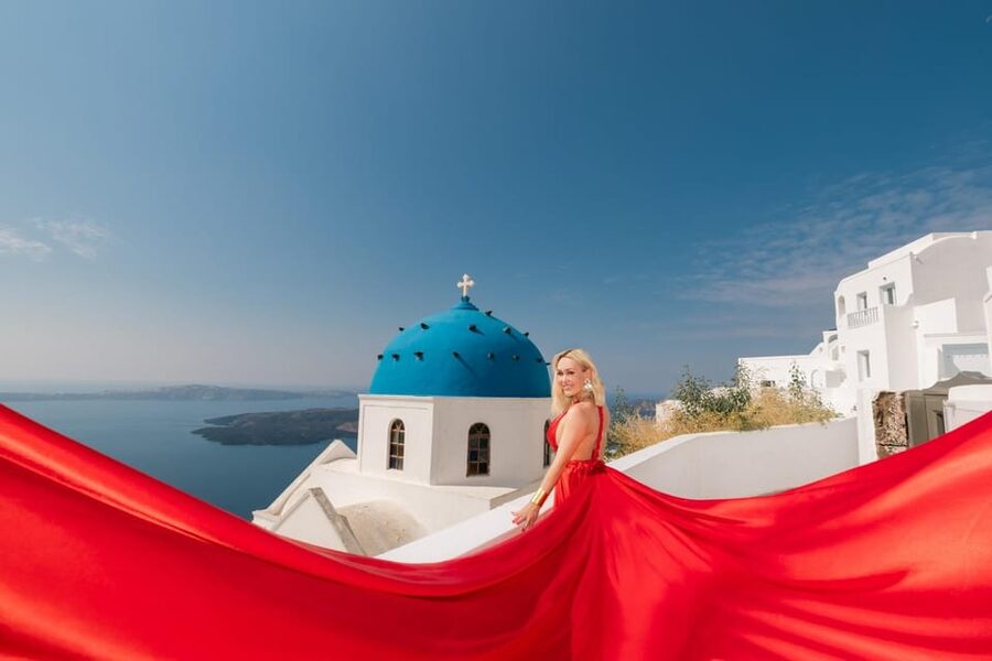 Flying dress Photoshoot in Santorini with Hotel Pickup - The Santorini backdrop is doing real work