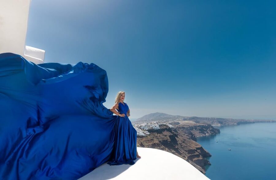 Flying dress Photoshoot in Santorini with Hotel Pickup - Choosing the dress and learning the pose