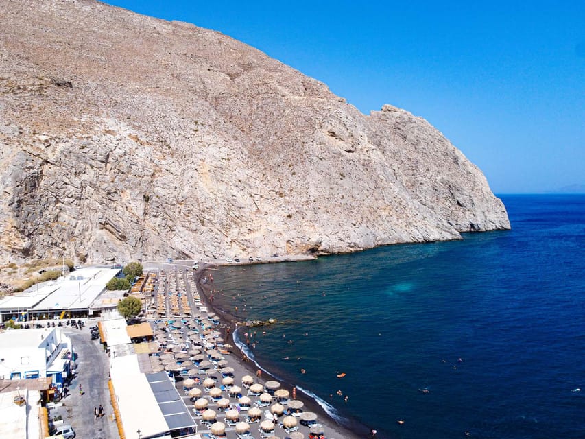 From Fira: Santorini Highlights Minibus Tour with Oia Sunset - Firostefani brings the classic blue-dome view