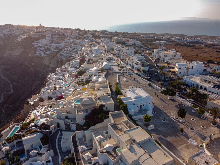 From Fira: Santorini Highlights Minibus Tour with Oia Sunset - The lighthouse adds a less expected stop