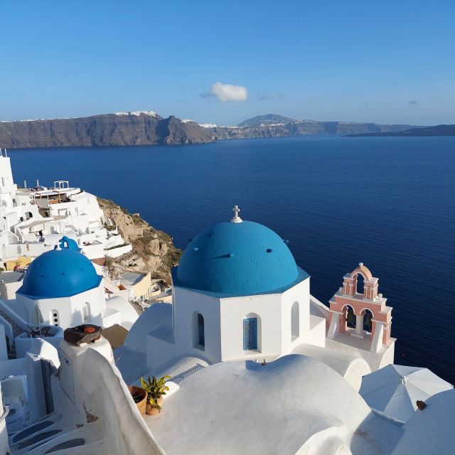 From Santorini: Guided Oia Morning Tour with Breakfast - The Three Bells of Fira in 15 minutes
