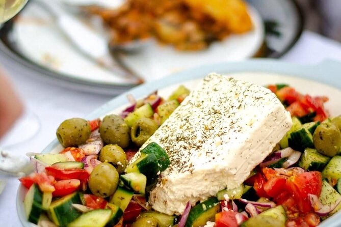 Greek Cuisine Cooking Class in Santorini with Recipes and Wine - Cooking Greek food in Megalochori