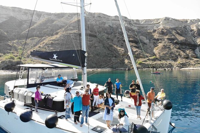 Half-Day Exclusive Catamaran Cruise in Santorini with Meal and Open Bar - Sunset cruises: beautiful, but not private