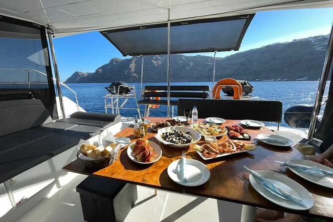 Half Day Premium Catamaran Cruise in Santorini including Oia - Santorini from the water, not from a postcard