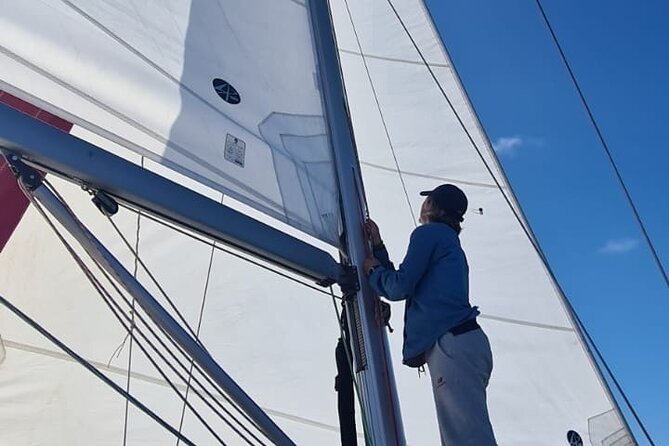 Half day Private Sailing cruise in Santorini island up to 6 pax - Passing Cape Akrotiri and entering the caldera