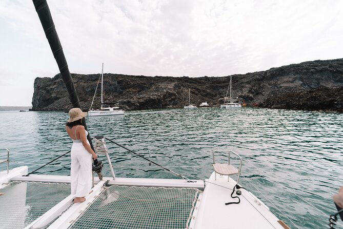 Half-Day Tailor-made Private Catamaran Cruise in Santorini - Fira Old Harbor and Oia views from the water