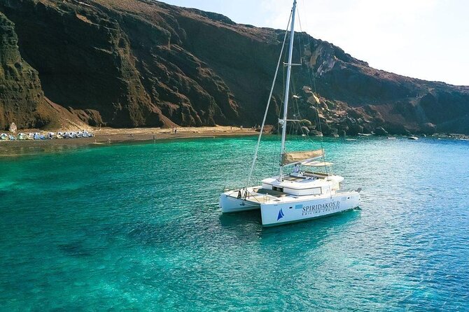 Island Hopping: Santorini Catamaran Charter Cruise with a skipper - Swimming, snorkeling, and the view from sea level