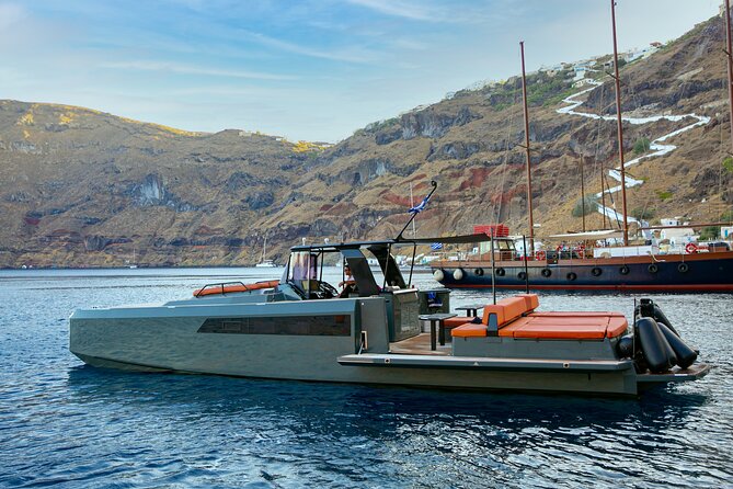 Luxury Private Power Catamaran Tour in Santorini - Swimming, cliff jumping, and time in the water