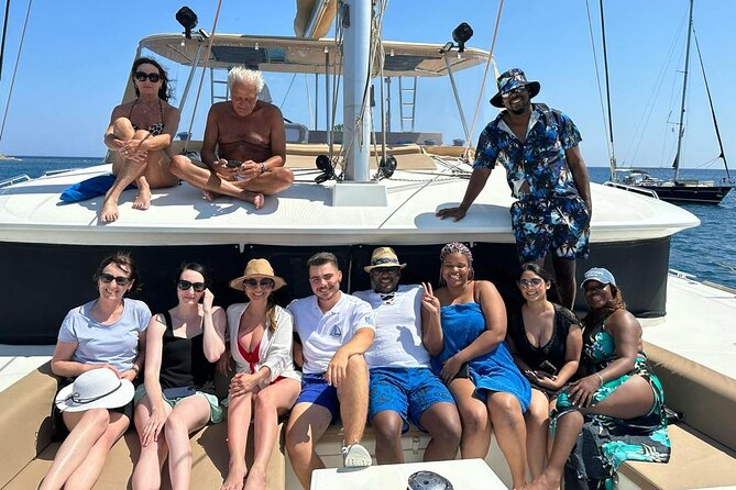 Luxury Santorini Catamaran Cruise: Lunch, BBQ, Drinks, Transfers - Red Beach, White Beach, Indian Rocks, and the lighthouse