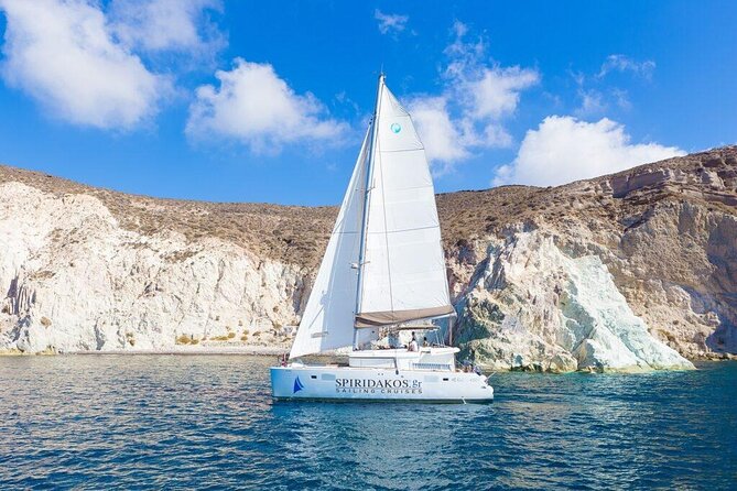 Luxury Small-Group Catamaran Cruise with BBQ, Open bar & Transfer - Why seeing Santorini from the water matters