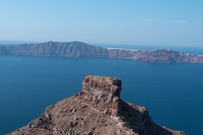 One Day in Santorini from Cruise Ship: Ultimate Island Tour - Akrotiri Lighthouse closes the route with a coastal landmark