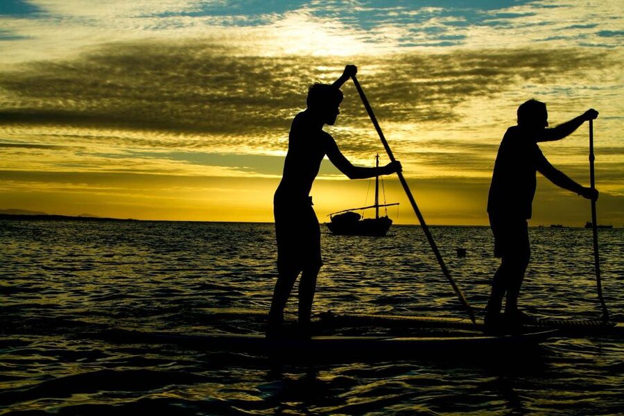 Paddle Board Rental: Glide on the Water with Ease - A water-level view of Santorini’s cliffs