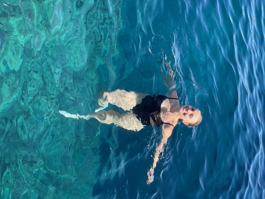 Private Boat tour with snorkeling & Sea Caves - Along Akrotiri’s volcanic cliffs