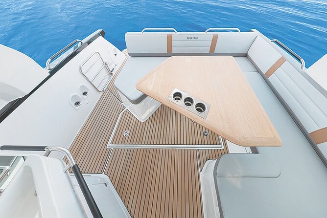 Private Caldera Cruise with Motor Yacht in Santorini - White Beach and its clear water