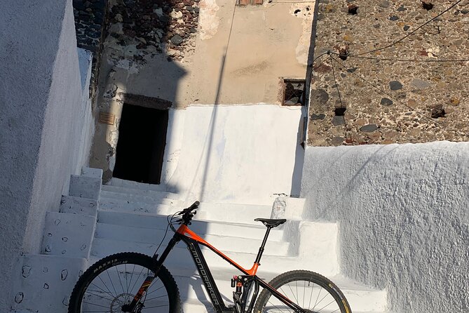 Private Electric Mountain Bike Experience and Tour in Santorini - The bikes, safety gear, and level of effort