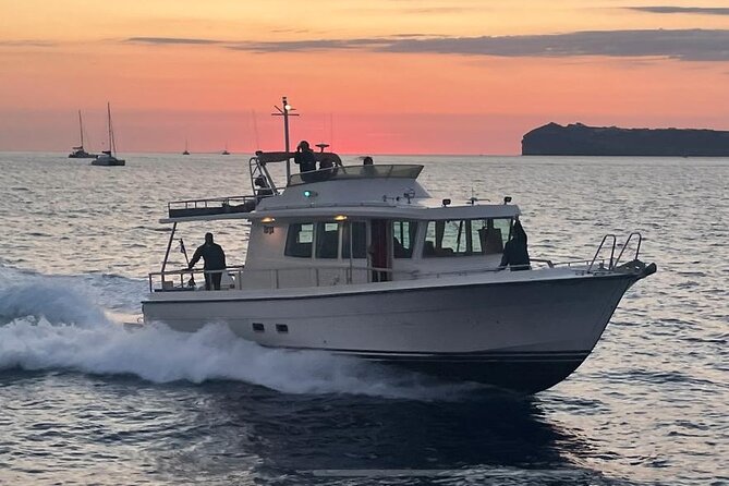 Private Full-Day Motor Yacht Cruise with Meal, Open Bar+Transfers - Red Beach and White Beach from the sea