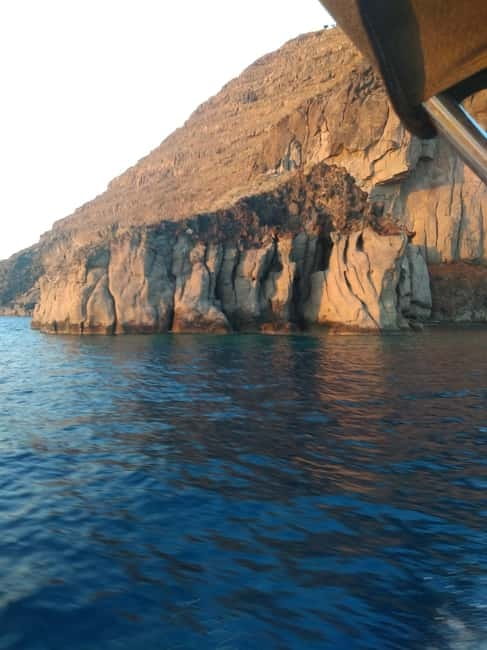 Private, fully customizable cruise in Santorini's caldera - Therasia, fisherman houses, and elephant skin rocks