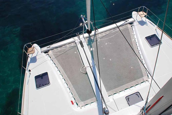 Private Morning Tour Lagoon 400-380 Sailing in Santorini ,lunch, drink, transfer - Returning through Vlychada port