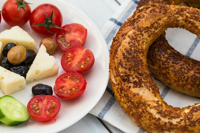 Private Santorini Villages Morning Walking Tour inc. tastings - Fira lunch with local beer and island flavors