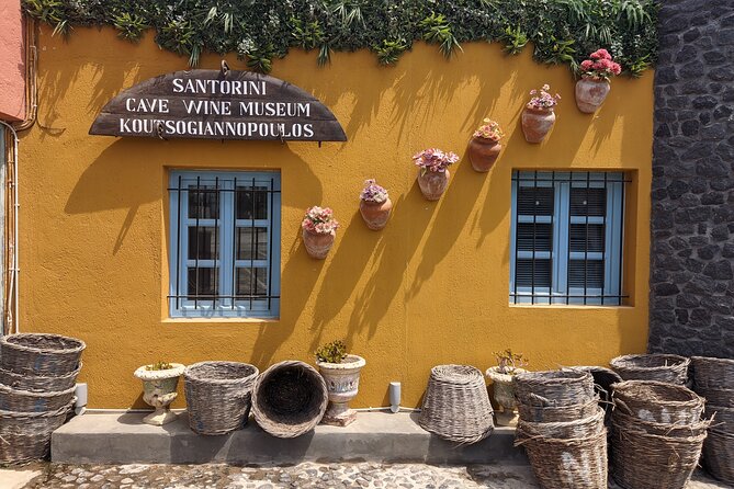Private Santorinian Wine Tour - Venetsanos pairs wine with a caldera view