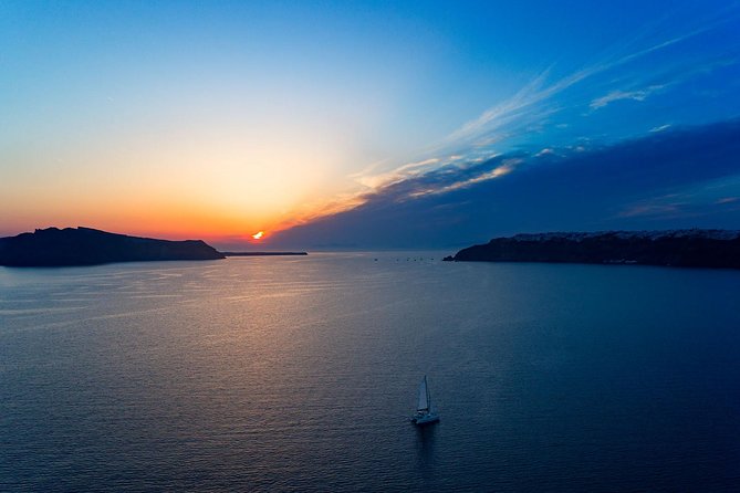 Private Sunset Cruise with Dinner and Drinks! - Sailing across the Santorini Caldera