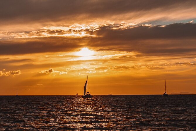 Private Sunset Cruise with Full Greek Dinner - Leaving Vlychada Marina for Santorini’s southern coast