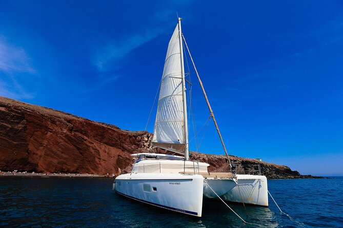 Private Sunset Cruise with Full Greek Dinner - The caldera view of Fira, Oia, and the volcano