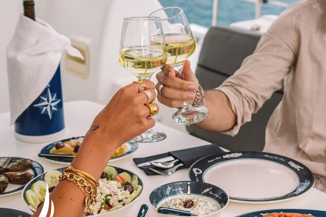 Private Sunset Cruise with Full Greek Dinner - Sunset from the catamaran, not the cliff