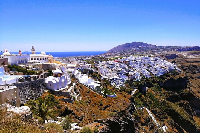 Private Unseen Authentic Santorini Half Day Island Tour - Yiannis as driver, guide, sommelier, and photographer