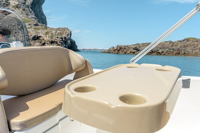 Rent a Boat in Santorini with Free License - When to hire Karolos as skipper