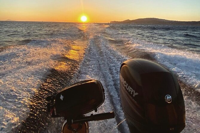 Rent a SpeedBoat in Santorini with License or Skippered - Oia looks best from below the cliffs