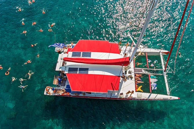 Sailing Catamaran Cruise in Santorini with BBQ, Drinks and Transfer - Starting at Ammoudi or Athinios Port